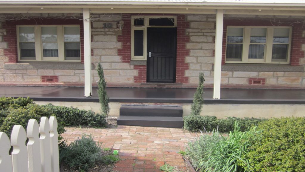 Concrete resurfacing, new black painted verandah