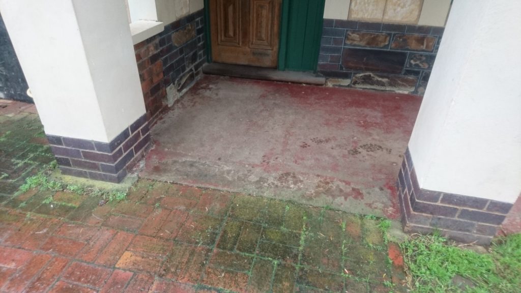 Old worn out concrete verandah, before