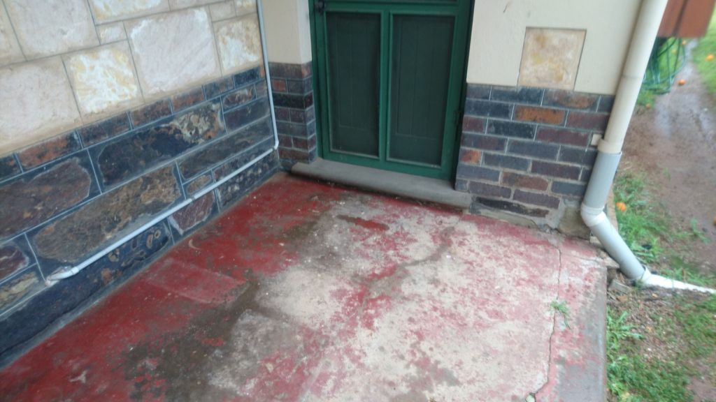 Old, worn, tired concrete verandah