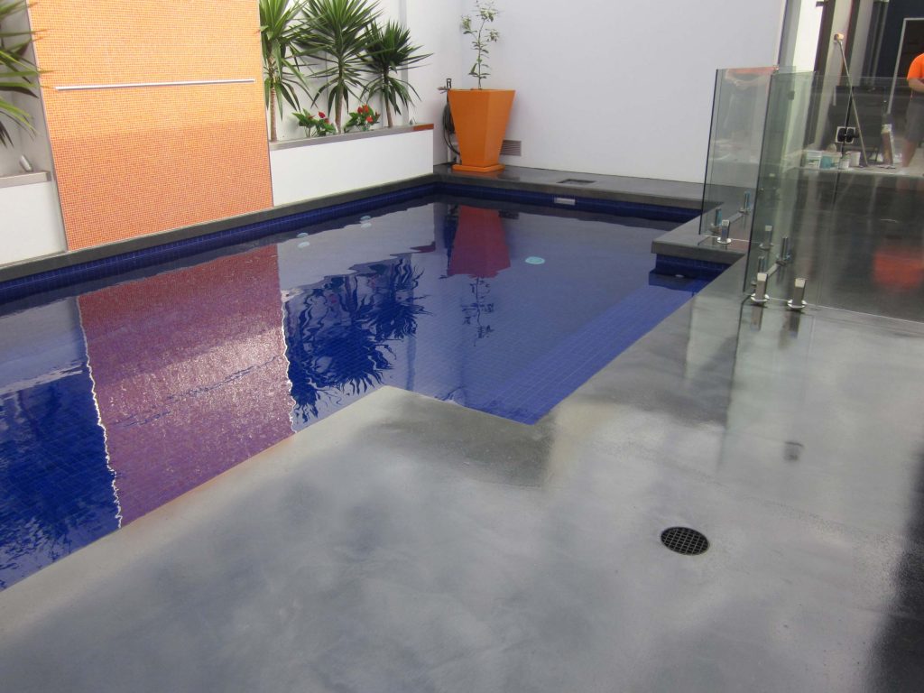 Concrete resurfacing: Reflective finish pool surround