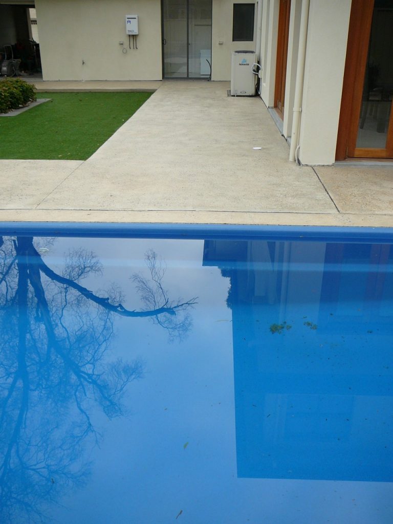 Pool surround: Exposed aggregate concrete