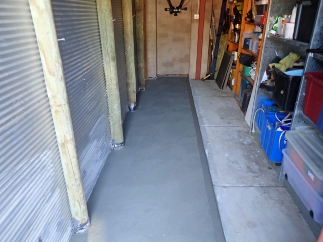 New concrete fill. Garage: After