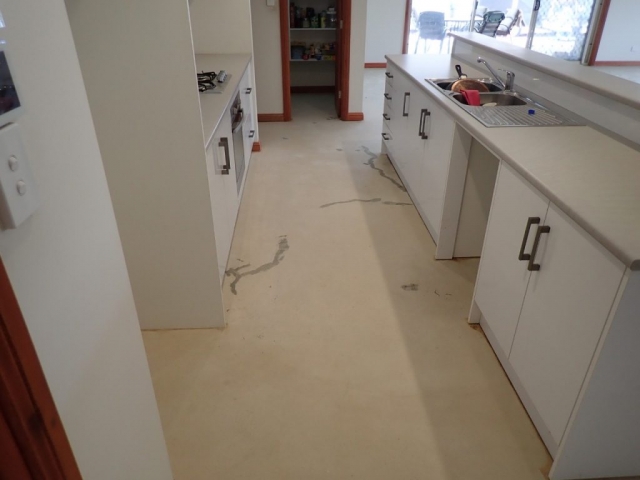 Concrete resurfacing: crack treatment of kitchen floor