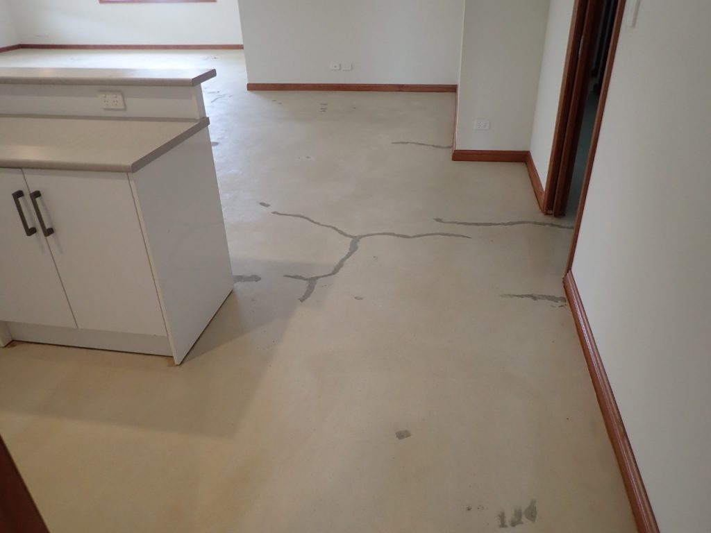 Concrete resurfacing: crack treatment of floor