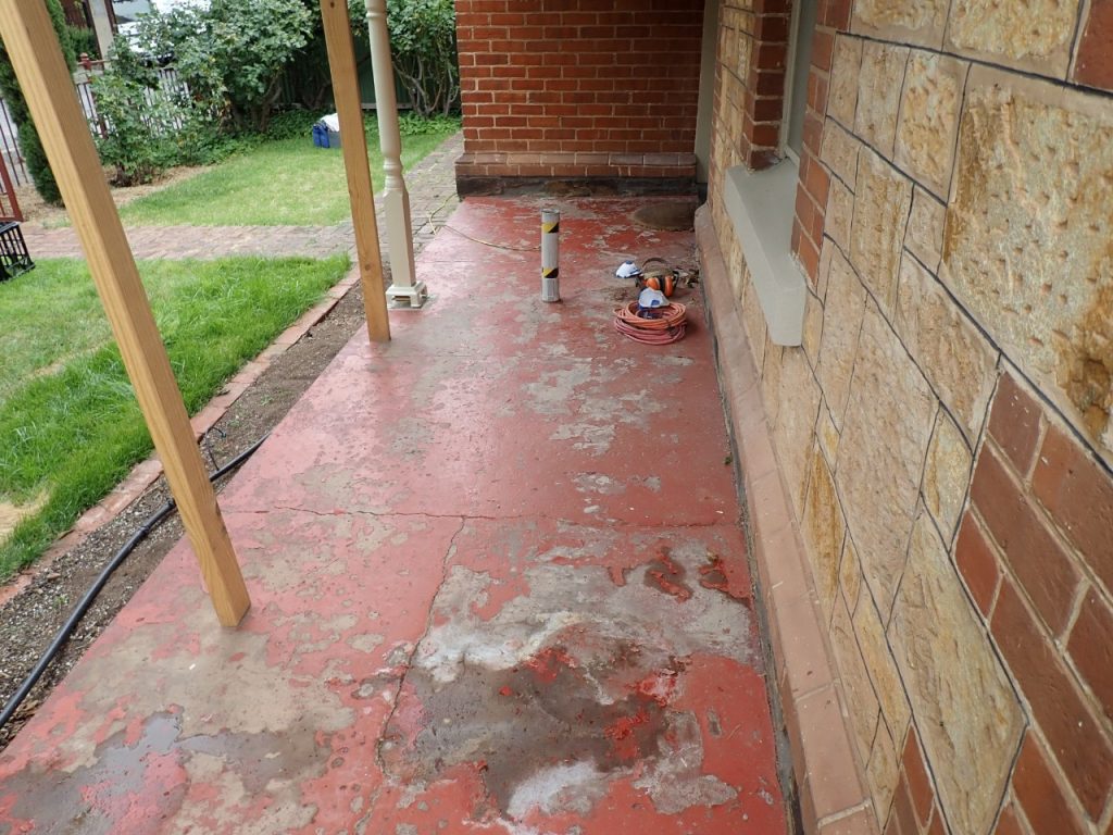 Concrete resurfacing, damaged front verandah, before