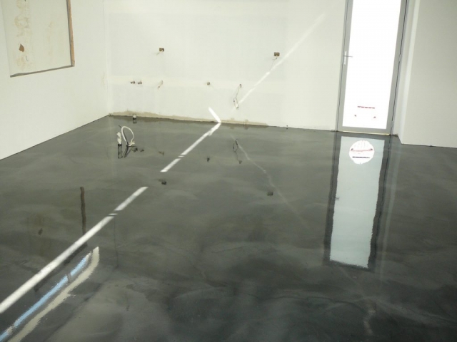 Concrete resurfacing: epoxy painted grey illusion floor