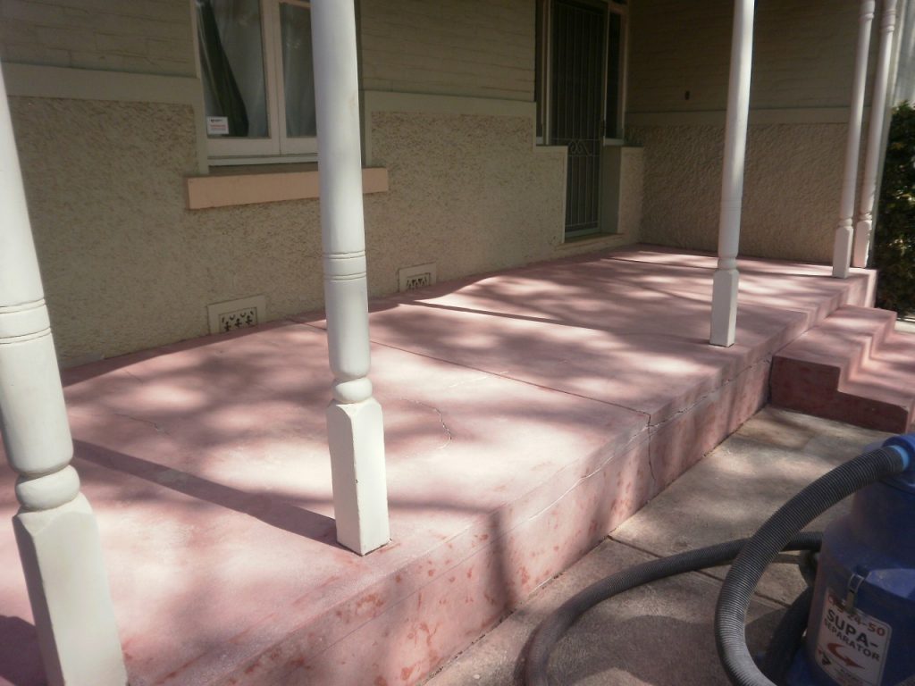 Concrete resurfacing, faded red verandah before