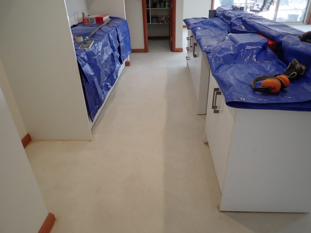 Concrete resurfacing: grinding of kitchen floor
