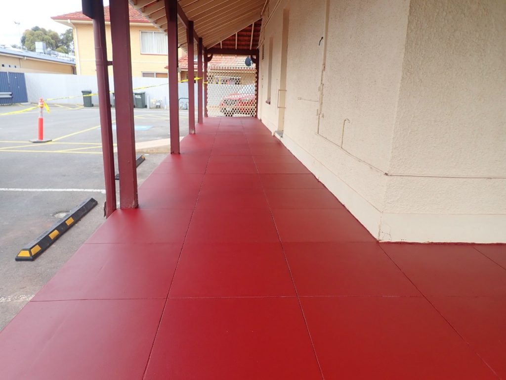 Concrete resurfacing, heritage red verandah