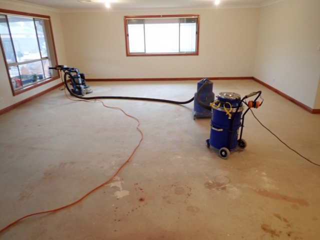 Concrete resurfacing: living area floor - Before
