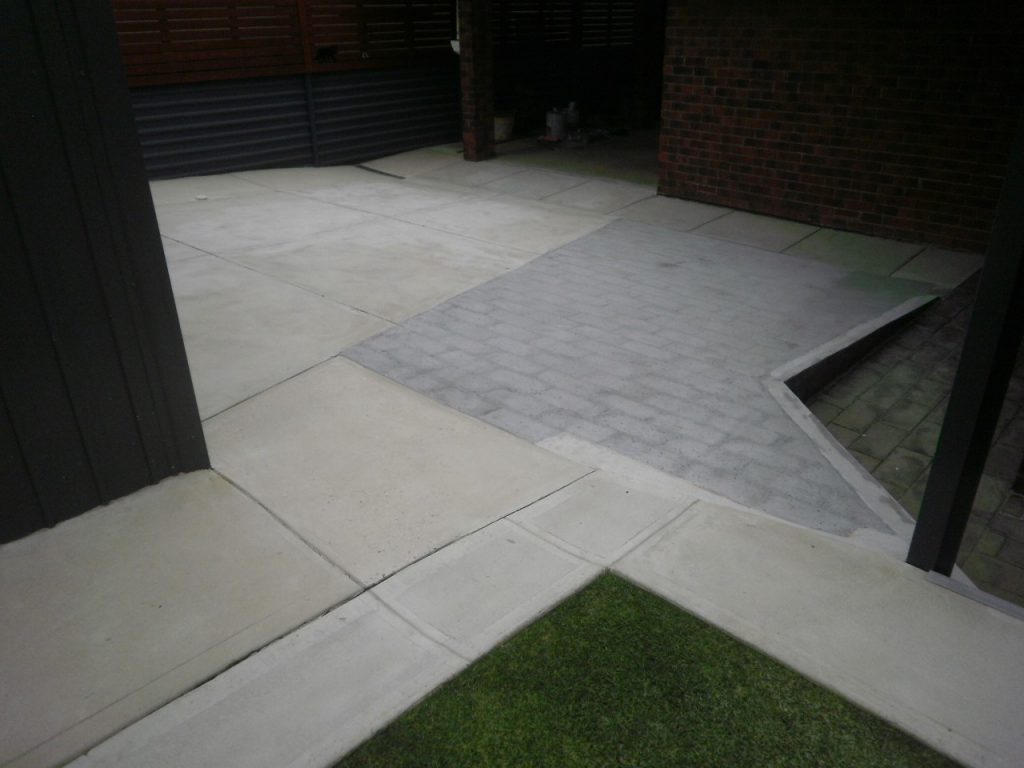 Concrete resurfacing, mismatched driveway, before