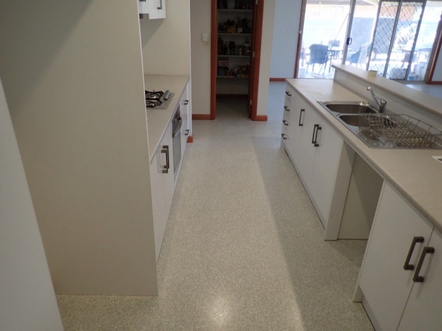 Concrete resurfacing: Multiflake kitchen floor - After