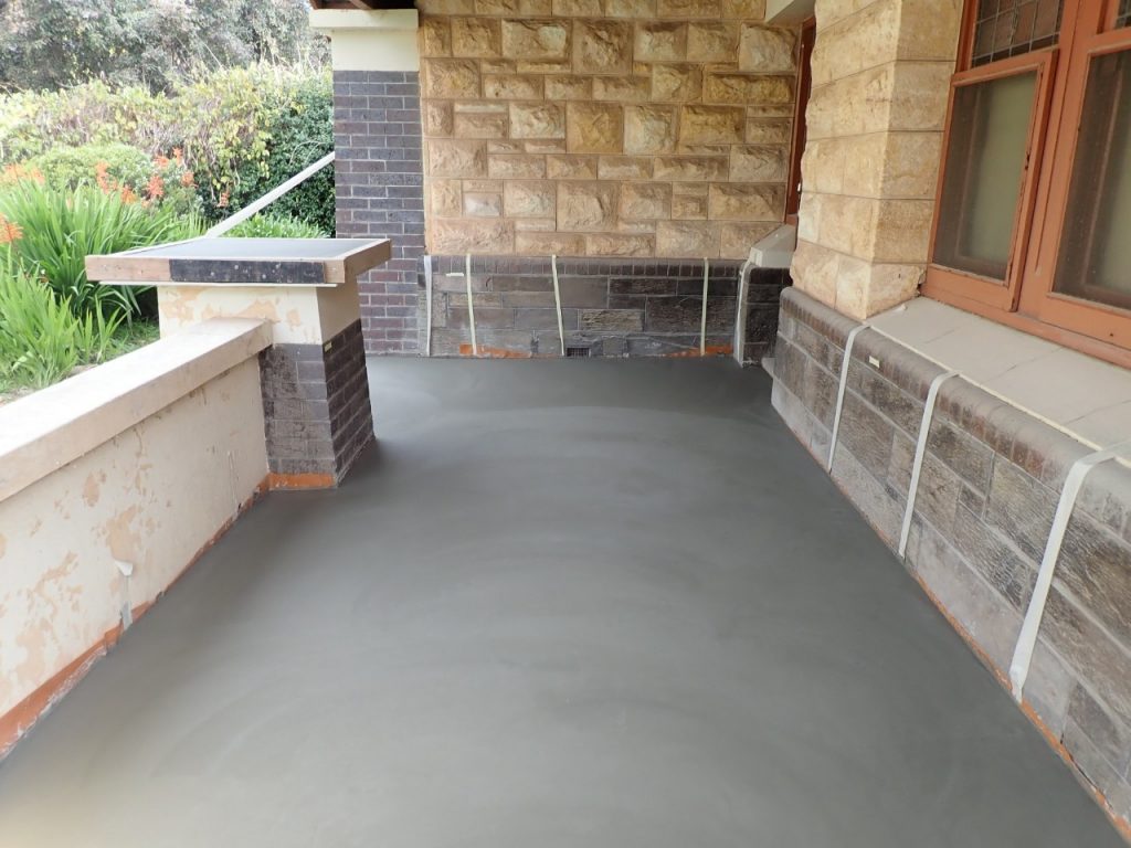 Concrete resurfacing, new concrete verandah poured.