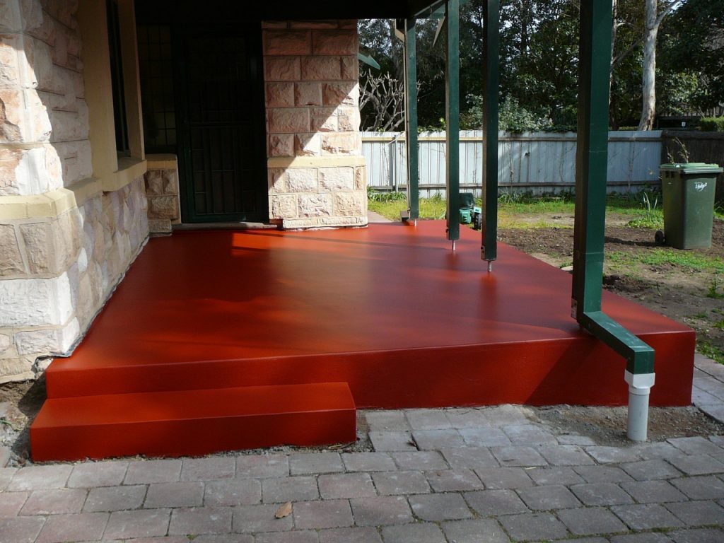 Concrete resurfacing, new red painted verandah