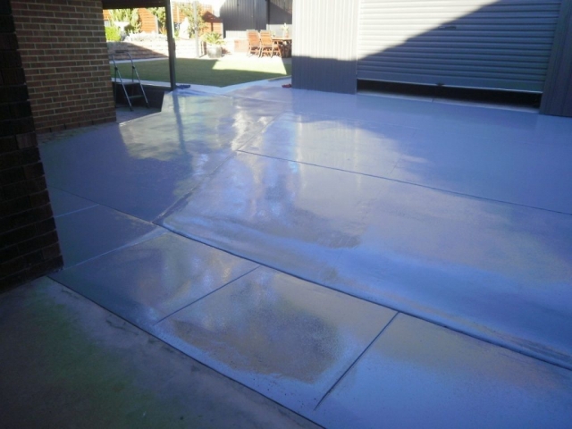 Concrete resurfacing, painted back patio