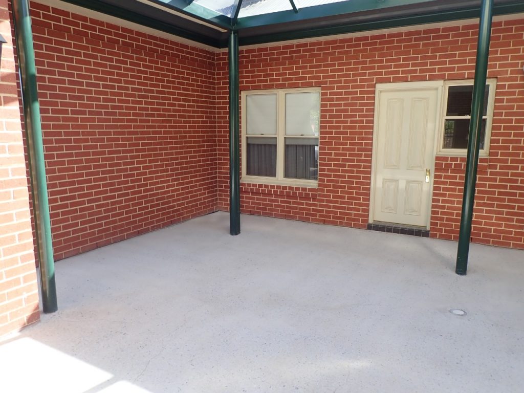 Concrete resurfacing, patio concrete after grinding
