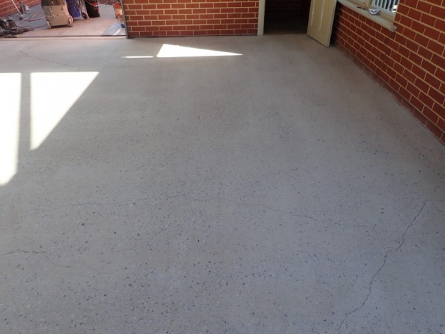 Concrete resurfacing, patio floor after grinding