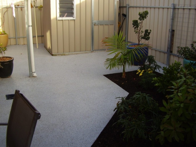 Concrete resurfacing, patio with black and white Multiflake