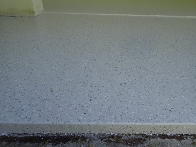 Concrete resurfacing, seamless floor, grey granite multiflake
