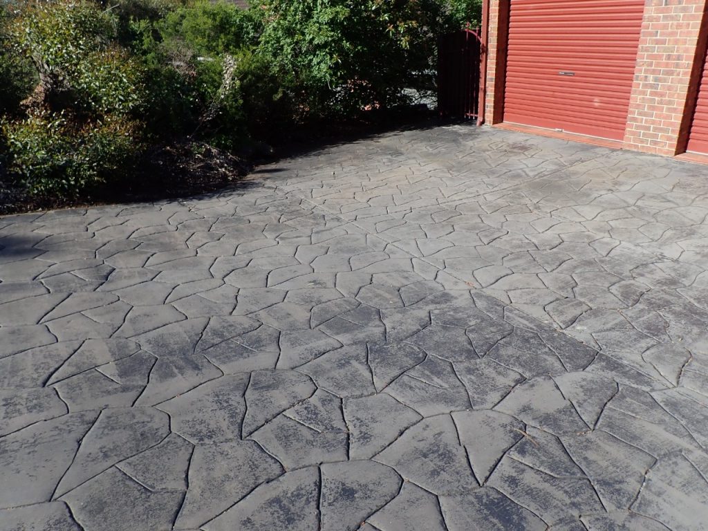 Concrete resurfacing, worn textured driveway