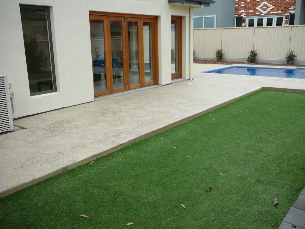 Pool surround & Patio: Exposed aggregate concrete
