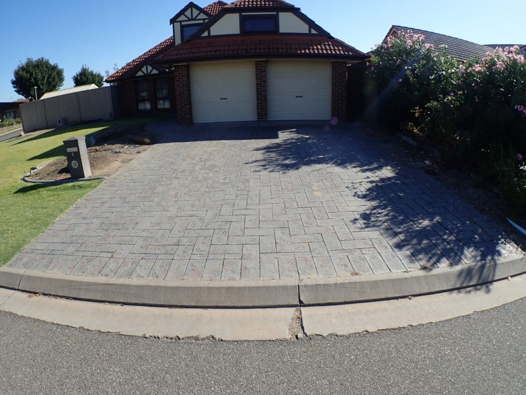 Resurfacing pavers, paved driveway before