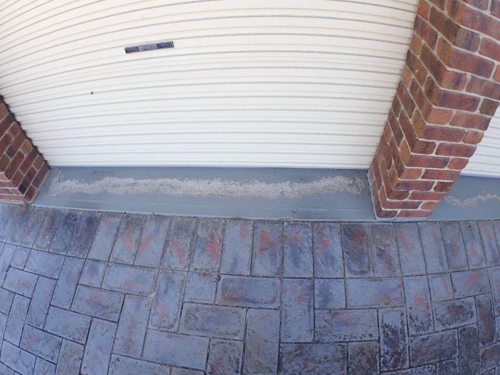 Resurfacing pavers, worn concrete and pavers, before