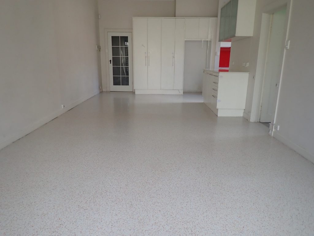 Slate resurfacing: Multiflake dining room floor - After