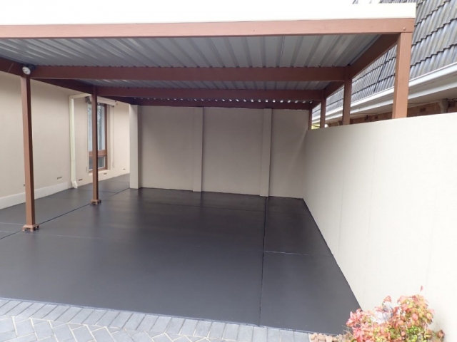 Concrete resurfacing. Carport painted: After