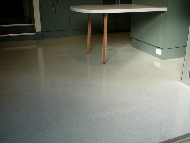 Concrete resurfacing: Kitchen floor Multiflake gloss finish