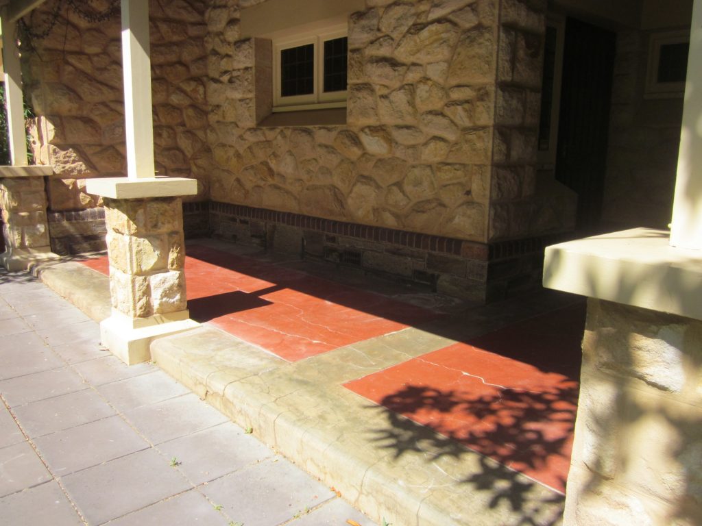 Cracked concrete verandah, two tone