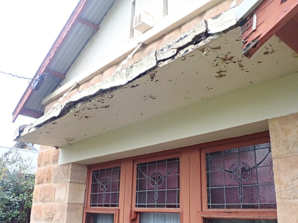 Concrete repairs: deteriorated concrete canopy