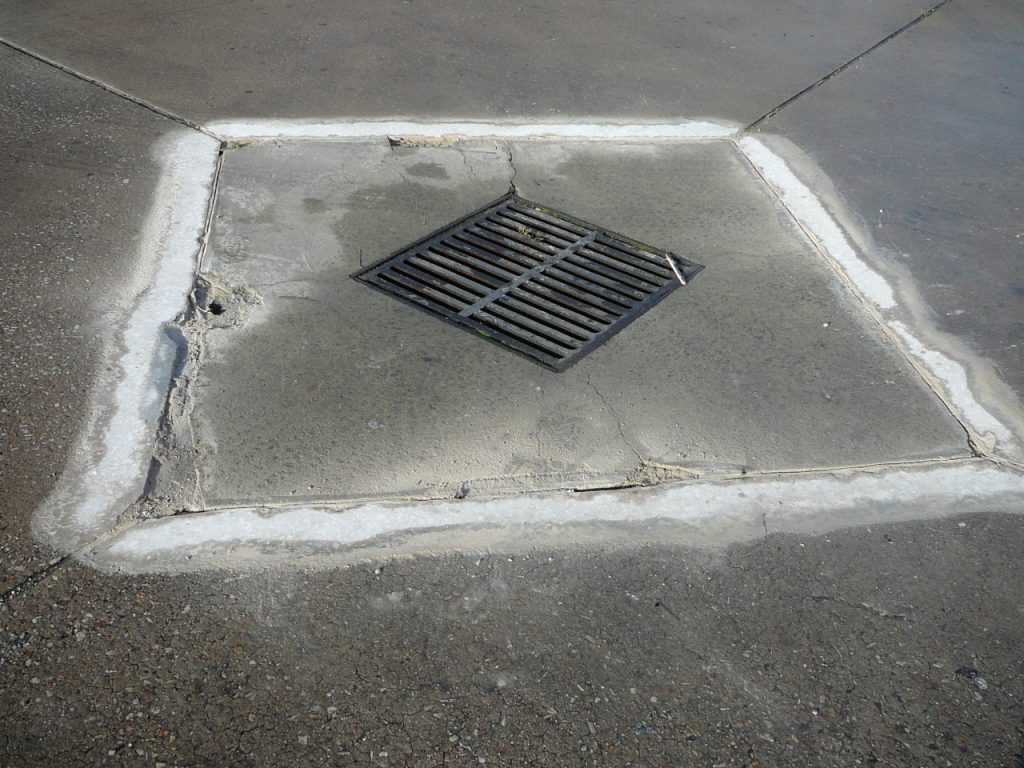 Concrete repairs: around storm water grate