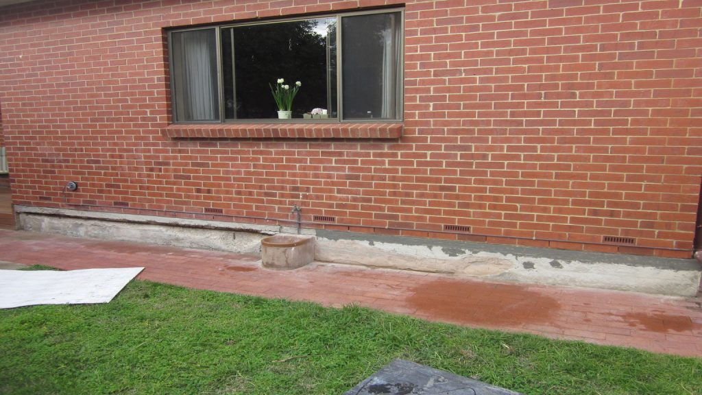 Concrete wall repairs: half patched