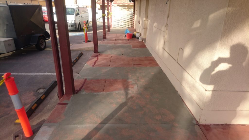 Concrete Resurfacing: grinding and filling in cracks
